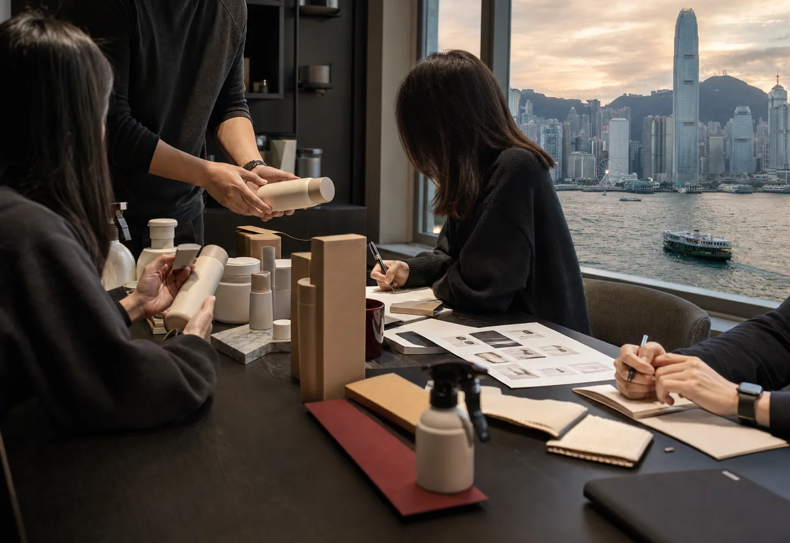 WELLWON trade team reviewing household products in a Hong Kong office